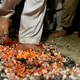 A Pakistani Shi’ite Muslim concentrates as he walks across hot coals as part of a religious ceremony.